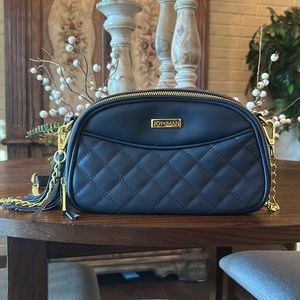 Joy & Iman blue crossbody purse.